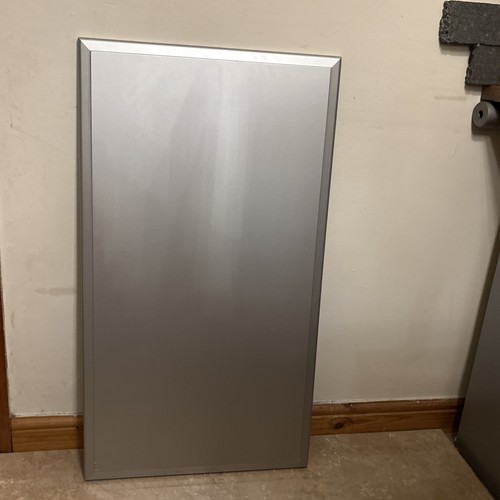 Sleek silver table - top, |